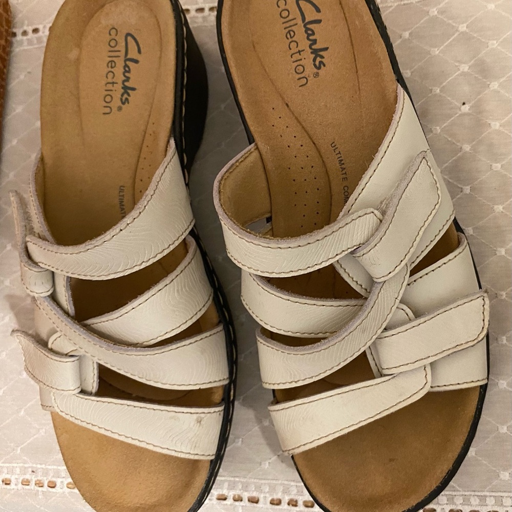 Two pairs Sketchers & Clark’s.  6 1/2.  Barely worn Great deal summer shoes.